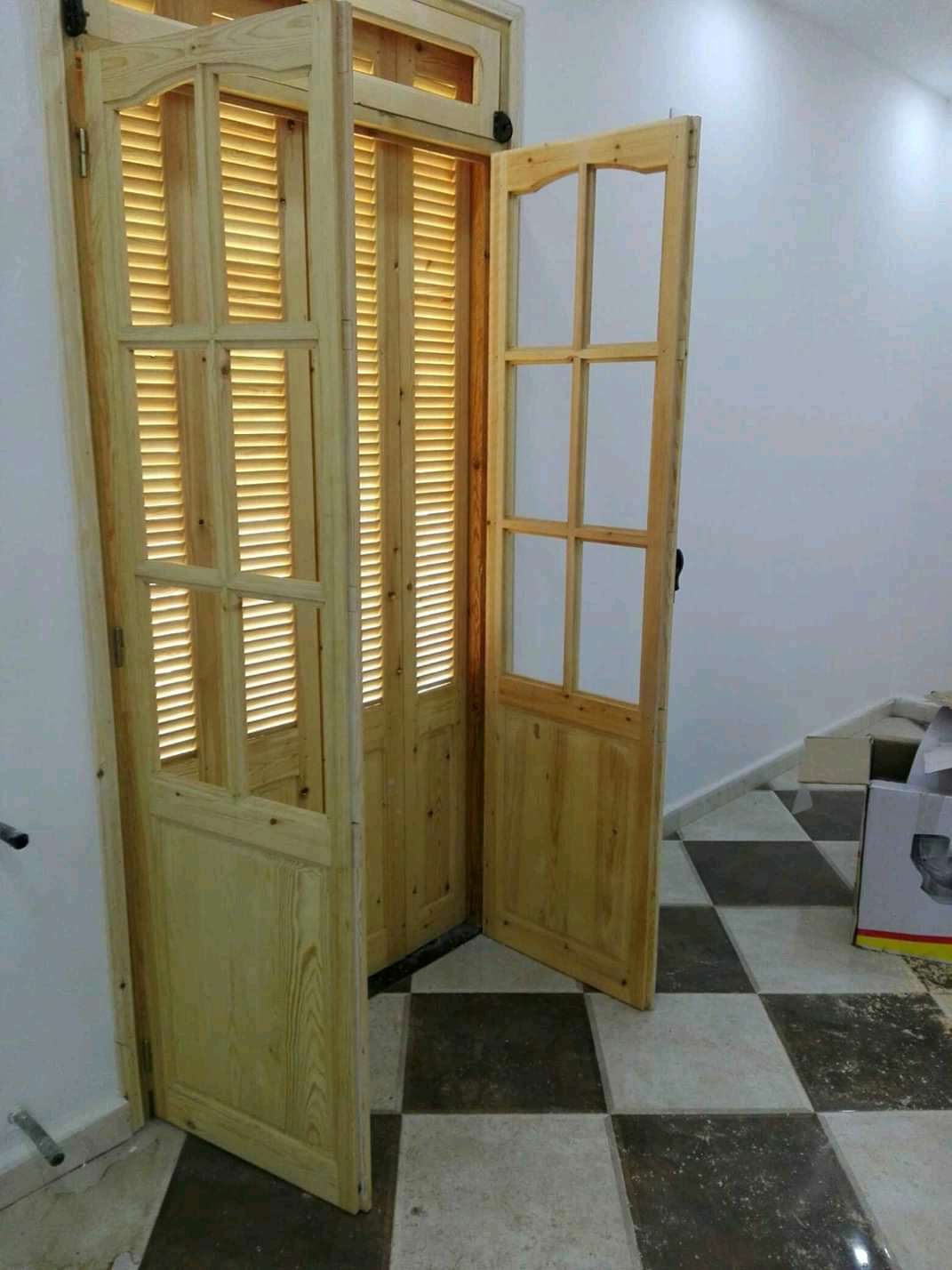 تركيب وسباغة الابواب